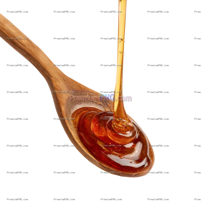Honey flowing from a wooden spoon