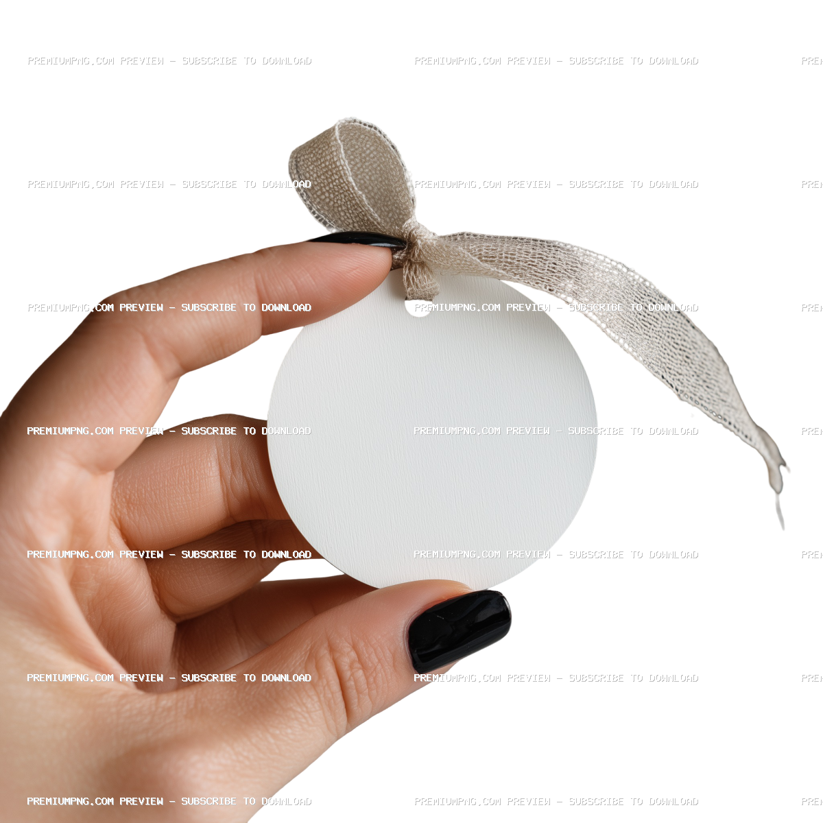 A blank white gift tag held in the hand on transparent background